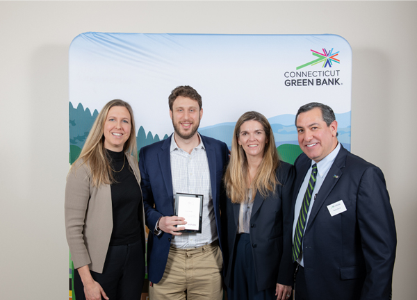 Bright Feeds team receives the Outstanding Project Environmental Infrastructure Award from the Connecticut Green Bank.